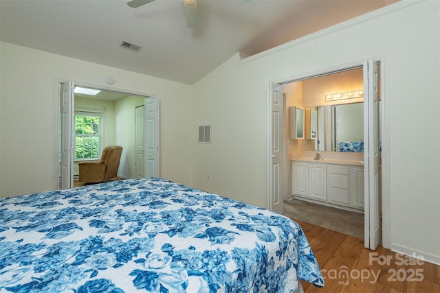 16 Red Barn Ln, Fletcher, NC 28732 - bedroom featuring light wood finished floors, lofted ceiling, connected bathroom, and ceiling fan
