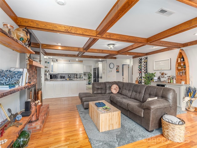 95 Harmon Ave, Lake Junaluska, NC 28745 - living room featuring light wood-style flooring, beamed ceiling, coffered ceiling, and recessed lighting