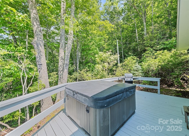 724 Pless Underwood Rd, Maggie Valley, NC 28751 - deck featuring a hot tub, area for grilling, and a wooded view