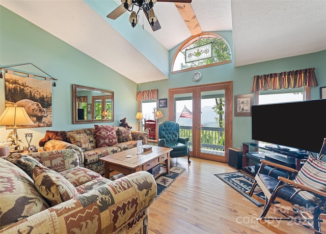 724 Pless Underwood Rd, Maggie Valley, NC 28751 - living area featuring ceiling fan, wood finished floors, french doors, and high vaulted ceiling