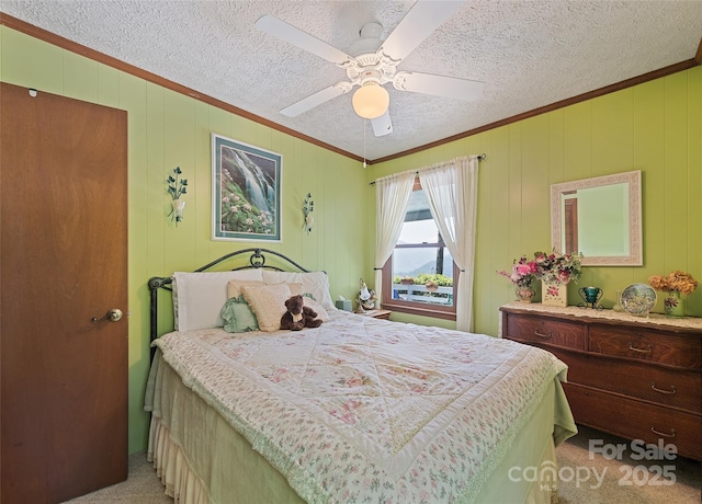 724 Pless Underwood Rd, Maggie Valley, NC 28751 - bedroom with light colored carpet, ornamental molding, a textured ceiling, and a ceiling fan