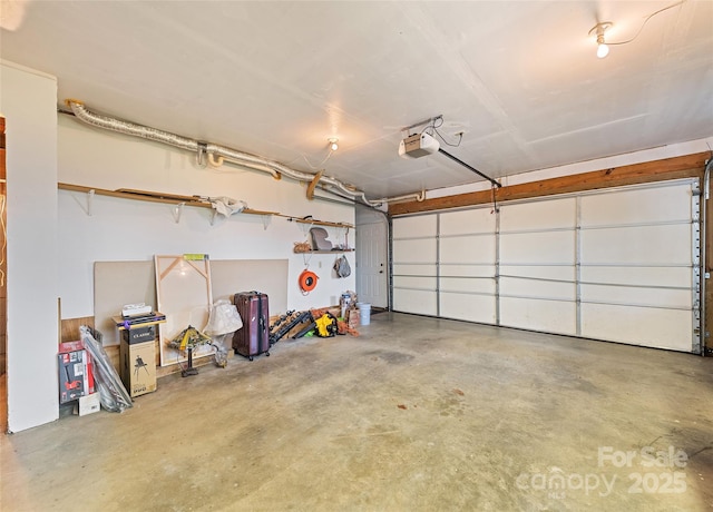 724 Pless Underwood Rd, Maggie Valley, NC 28751 - garage featuring a garage door opener