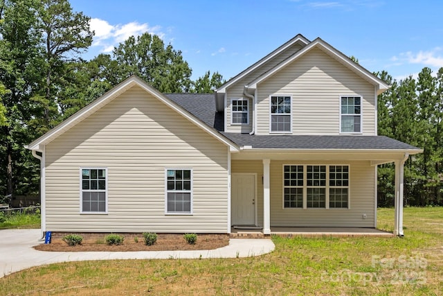 130 Aurora Blvd, Matthews, NC 28105 - traditional home with a front lawn and a shingled roof