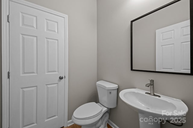 130 Aurora Blvd, Matthews, NC 28105 - bathroom featuring toilet and baseboards