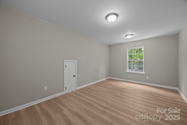 130 Aurora Blvd, Matthews, NC 28105 - empty room with light wood-style flooring and baseboards