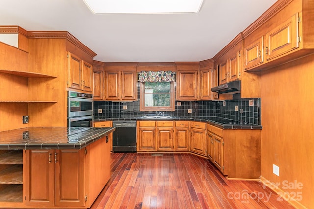220 Blackberry Trl, Concord, NC 28027 - kitchen with black dishwasher, open shelves, brown cabinets, and double oven