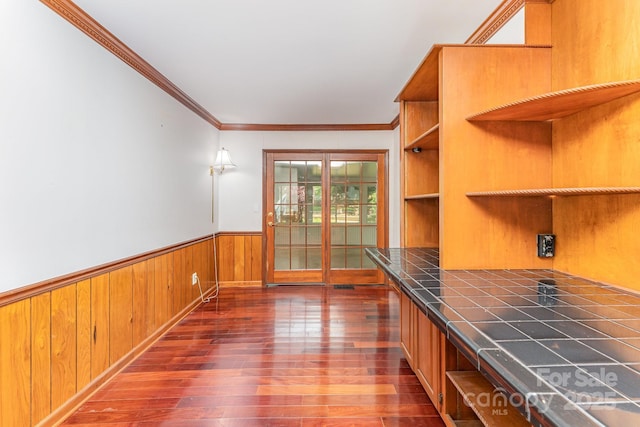 220 Blackberry Trl, Concord, NC 28027 - kitchen with tile countertops, hardwood / wood-style floors, a wainscoted wall, open shelves, and ornamental molding