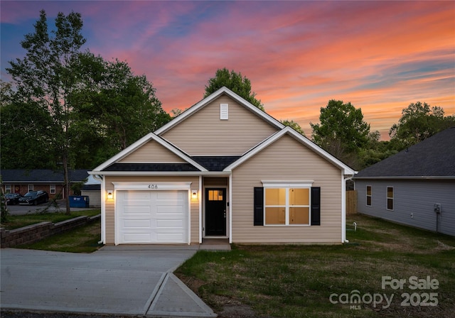 1231 Edgewood Rd, Charlotte, NC 28208 - traditional home with driveway, a garage, and a yard