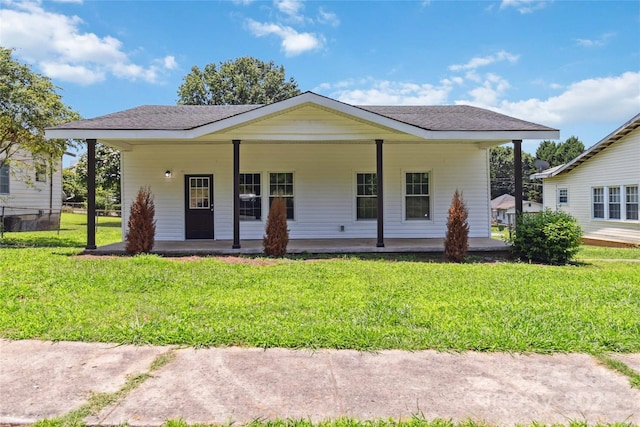 113 Woodside Ave, Gastonia, NC 28054 - view of front facade featuring a front lawn, covered porch, and roof with shingles