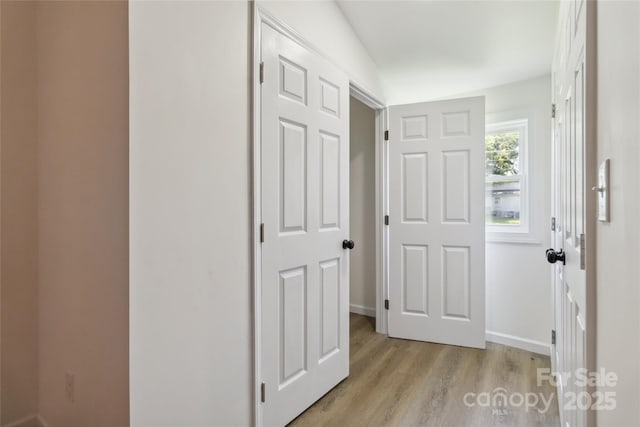 113 Woodside Ave, Gastonia, NC 28054 - hallway featuring light wood finished floors and baseboards