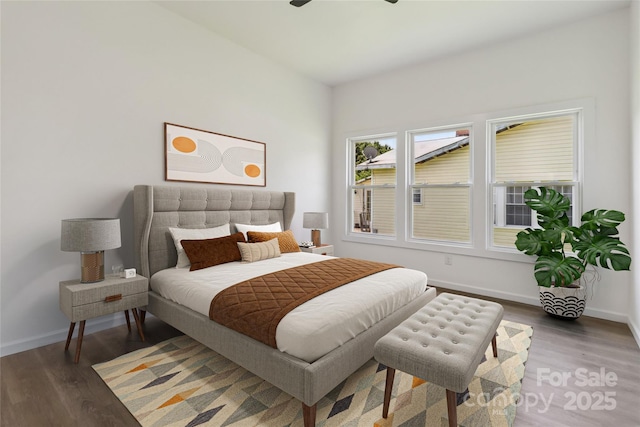 113 Woodside Ave, Gastonia, NC 28054 - bedroom with baseboards and wood finished floors