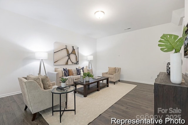 24578 Blue Heron Cir Unit 407, Lancaster, SC 29720 - living room featuring dark wood-style flooring and baseboards