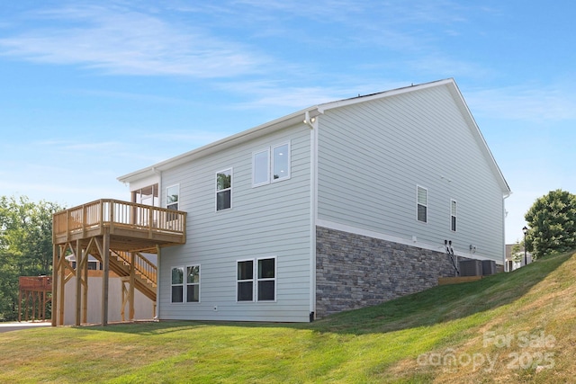 24578 Blue Heron Cir Unit 407, Lancaster, SC 29720 - back of house with stairs, a deck, a lawn, and stone siding
