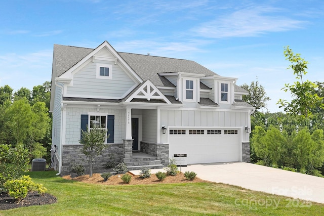 24578 Blue Heron Cir Unit 407, Lancaster, SC 29720 - craftsman-style house with roof with shingles, concrete driveway, stone siding, and a garage