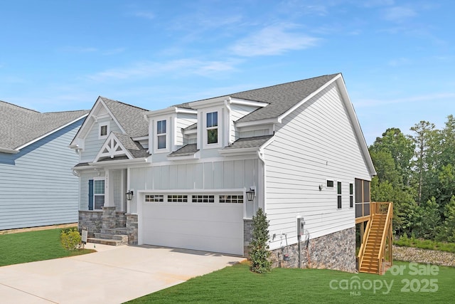 24578 Blue Heron Cir Unit 407, Lancaster, SC 29720 - view of front of house with a shingled roof, stairway, concrete driveway, board and batten siding, and a garage