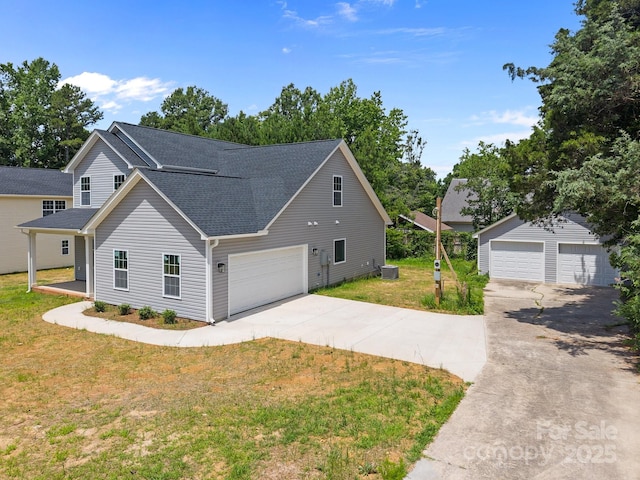 126 Aurora Blvd, Matthews, NC 28105 - view of front of home with a front lawn, a shingled roof, and an outbuilding