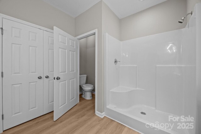 126 Aurora Blvd, Matthews, NC 28105 - full bathroom with wood finished floors and a shower