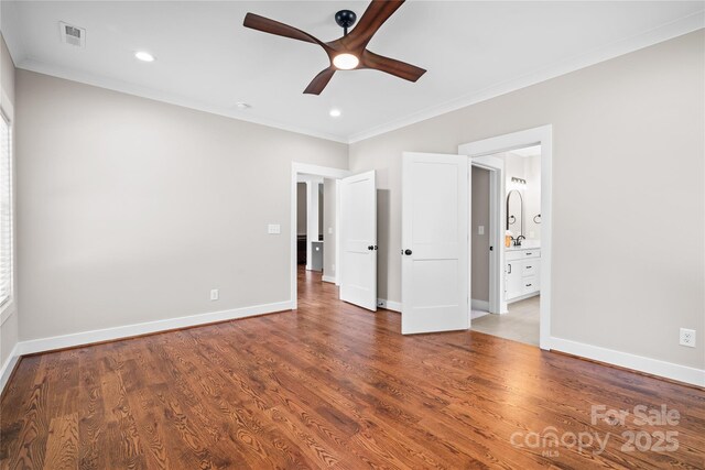 1004 E Sandy Ridge Rd, Monroe, NC 28112 - unfurnished bedroom with crown molding, wood finished floors, recessed lighting, connected bathroom, and ceiling fan