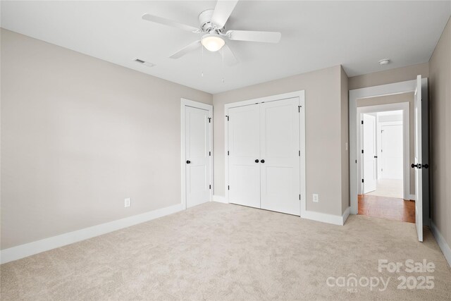 1004 E Sandy Ridge Rd, Monroe, NC 28112 - unfurnished bedroom featuring carpet flooring and ceiling fan