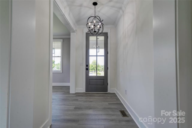 102 Starmount Dr, Kings Mountain, NC 28086 - foyer entrance with crown molding, a chandelier, baseboards, and dark wood-type flooring