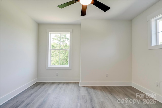 102 Starmount Dr, Kings Mountain, NC 28086 - empty room featuring wood finished floors, a ceiling fan, and baseboards