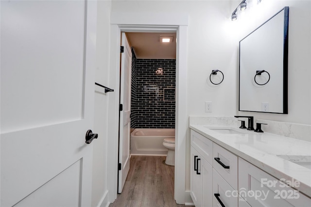 102 Starmount Dr, Kings Mountain, NC 28086 - full bathroom with vanity, toilet, wood finished floors, and shower / bathtub combination