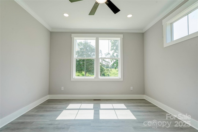 102 Starmount Dr, Kings Mountain, NC 28086 - empty room with healthy amount of natural light, ornamental molding, ceiling fan, recessed lighting, and wood finished floors
