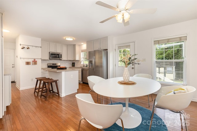 1912 Baxter St, Charlotte, NC 28204 - dining room with wood-type flooring and a ceiling fan