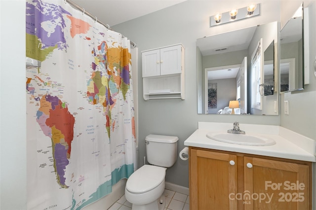 1912 Baxter St, Charlotte, NC 28204 - bathroom with vanity and tile patterned flooring