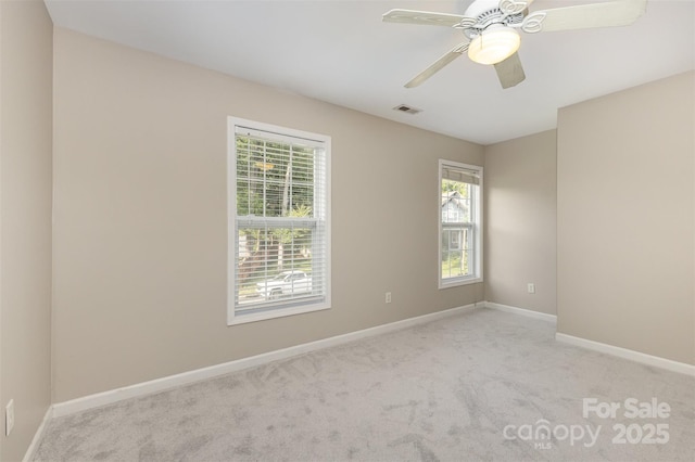 1912 Baxter St, Charlotte, NC 28204 - carpeted empty room with baseboards and a ceiling fan