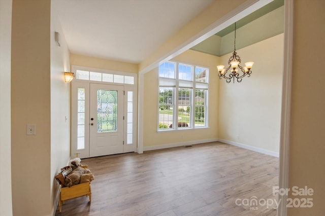 30 Linn Garden Ln, Swannanoa, NC 28778 - entryway featuring wood finished floors and a chandelier