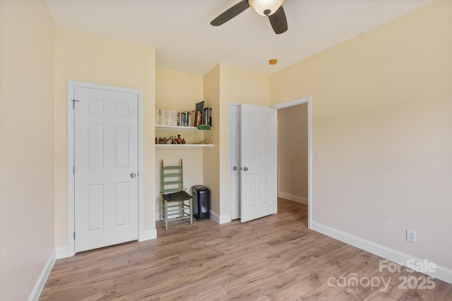 30 Linn Garden Ln, Swannanoa, NC 28778 - unfurnished bedroom with wood finished floors and a ceiling fan