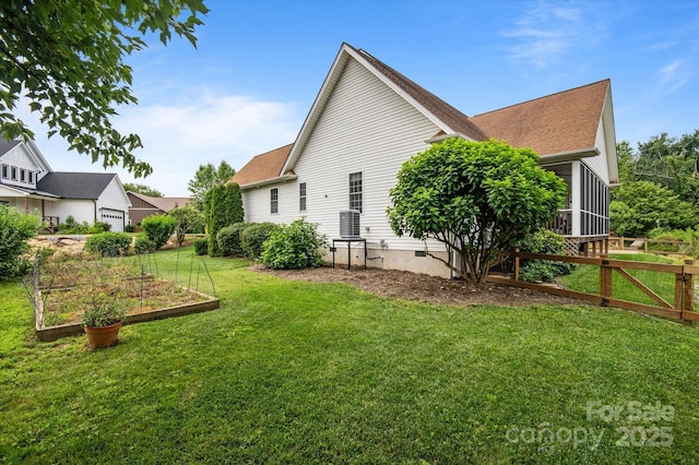 30 Linn Garden Ln, Swannanoa, NC 28778 - back of property featuring a garden, roof with shingles, and a garage