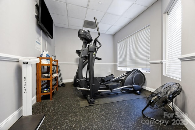 415 N Church St Unit 311, Charlotte, NC 28202 - exercise room with baseboards and a drop ceiling