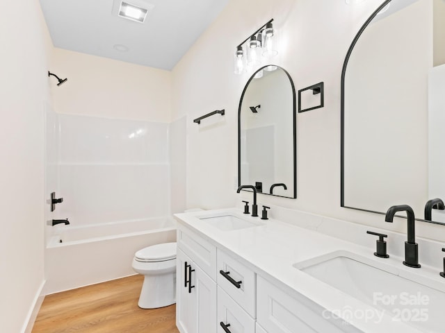 169 Vineyard Village Dr S Unit 4, Old Fort, NC 28762 - full bath featuring wood finished floors, double vanity, and shower / tub combination