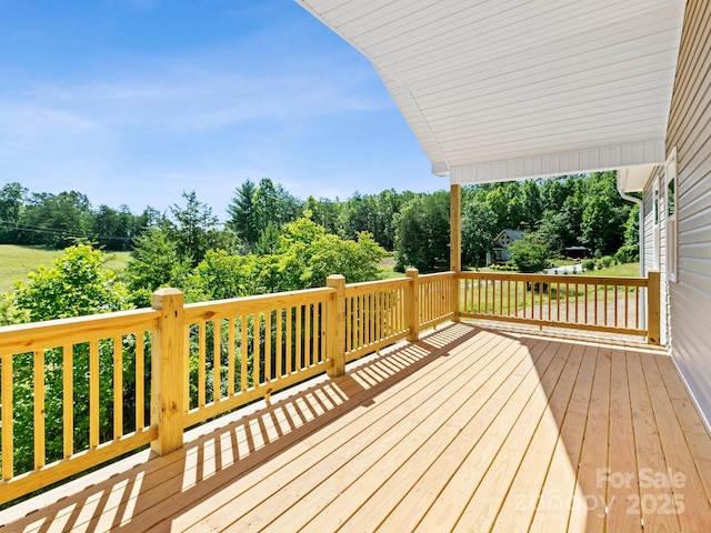 169 Vineyard Village Dr S Unit 4, Old Fort, NC 28762 - wooden deck with view of scattered trees