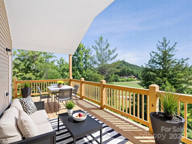 169 Vineyard Village Dr S Unit 4, Old Fort, NC 28762 - wooden terrace featuring outdoor dining area and outdoor lounge area