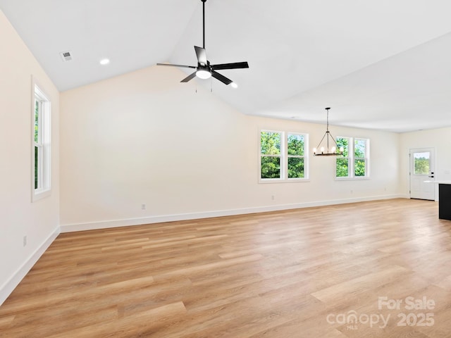 169 Vineyard Village Dr S Unit 4, Old Fort, NC 28762 - unfurnished living room with healthy amount of natural light, a chandelier, vaulted ceiling, light wood-style flooring, and recessed lighting