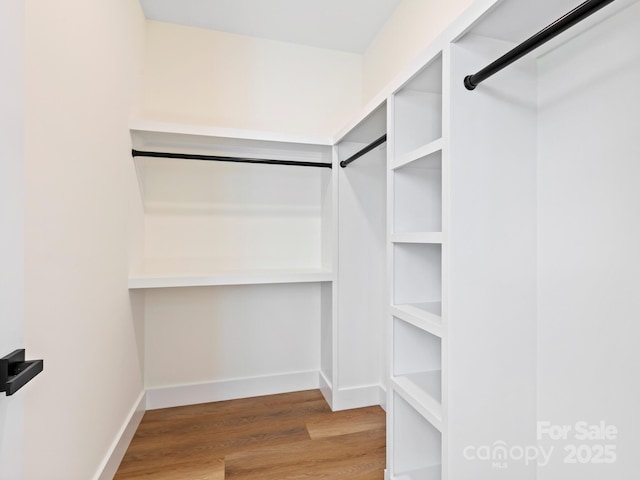 169 Vineyard Village Dr S Unit 4, Old Fort, NC 28762 - walk in closet with wood finished floors