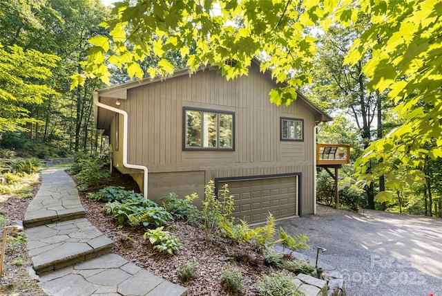 12 Beech Tree Ln, Asheville, NC 28804 - view of side of home with an attached garage and driveway