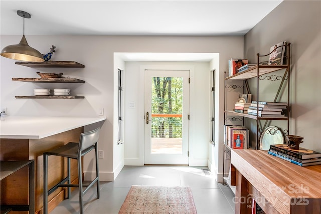 12 Beech Tree Ln, Asheville, NC 28804 - doorway to outside featuring baseboards and tile patterned floors