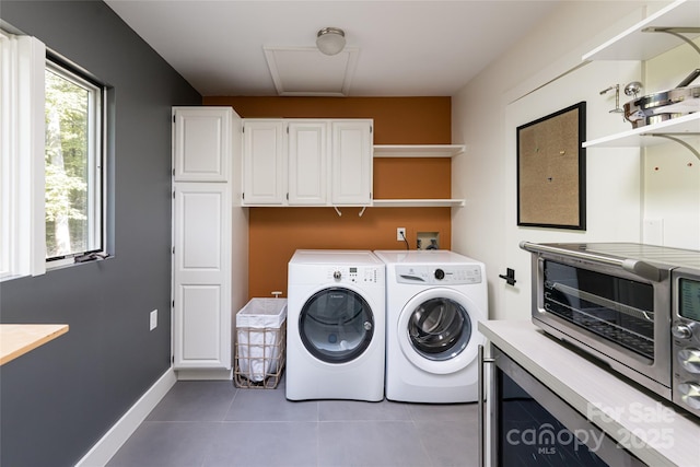 12 Beech Tree Ln, Asheville, NC 28804 - washroom with tile patterned floors, cabinet space, and washer and clothes dryer