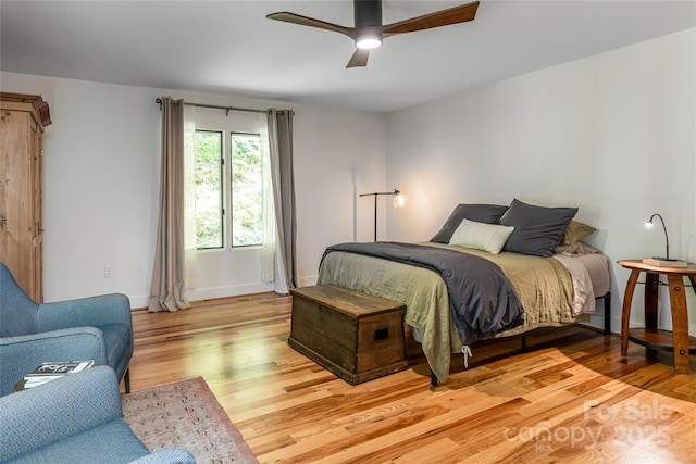 12 Beech Tree Ln, Asheville, NC 28804 - bedroom featuring light wood-type flooring and ceiling fan