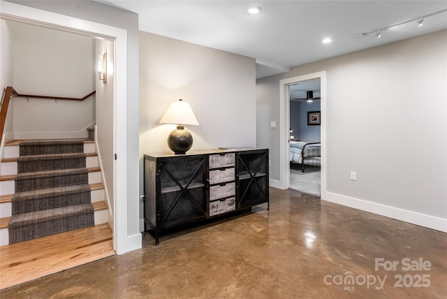 12 Beech Tree Ln, Asheville, NC 28804 - hallway with finished concrete flooring, stairway, and recessed lighting