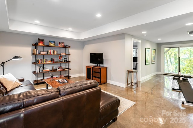 12 Beech Tree Ln, Asheville, NC 28804 - living area featuring recessed lighting, a tray ceiling, and concrete flooring