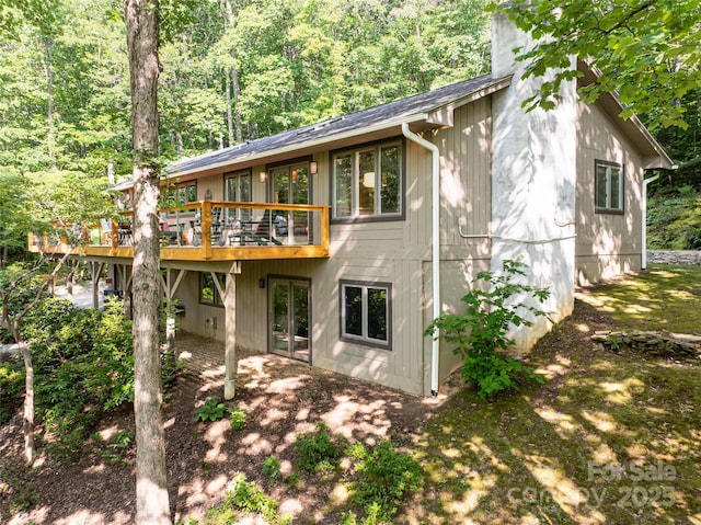 12 Beech Tree Ln, Asheville, NC 28804 - back of house with a wooden deck and a chimney
