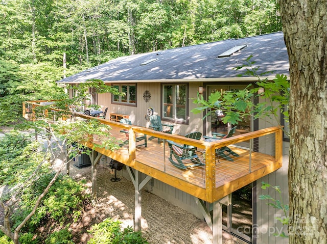 12 Beech Tree Ln, Asheville, NC 28804 - wooden deck with a wooded view