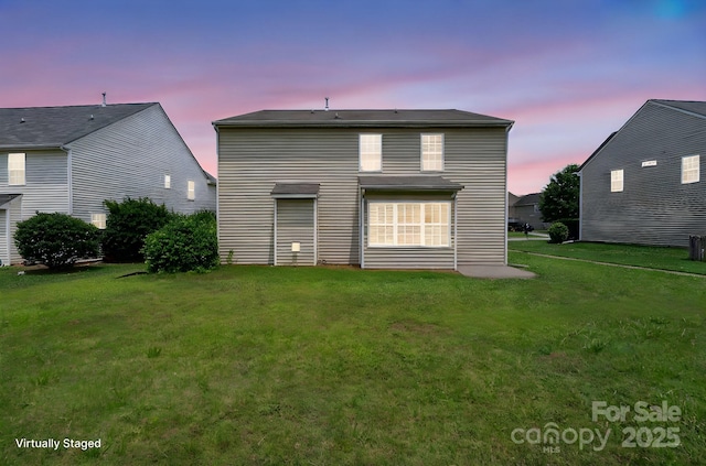 8915 Merrie Rose Ave, Charlotte, NC 28213 - rear view of house featuring a yard