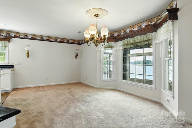 441 Wildlife Club Ln, Taylorsville, NC 28681 - unfurnished dining area featuring a chandelier, baseboards, and light colored carpet