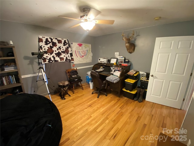 5570 George Henry Dr, Hickory, NC 28602 - home office with a ceiling fan and wood finished floors